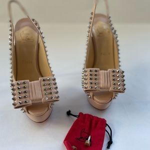 Christian Louboutin Clou Noeud Spike Pumps
EU 36